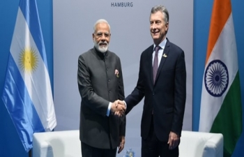 PM Narendra Modi meets President Mauricio Macri at the 2017 G20 summit in Hamburg, 8 July 2017